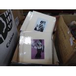 Box of photo's of Banksy's artworks