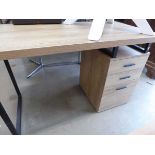 Contemporary design desk with light oak top matching 3 drawer pedestal on black supports