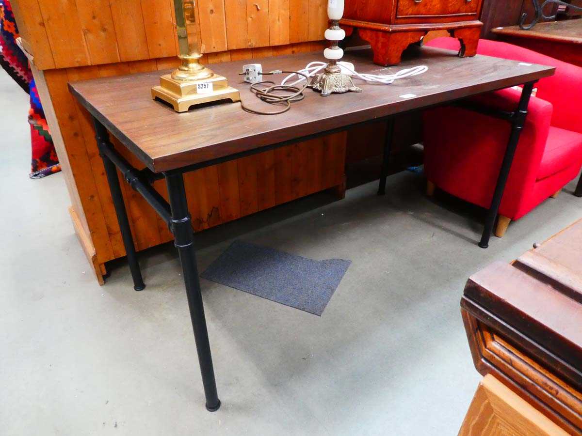 Dark wood topped dining table on scaffold effect legs