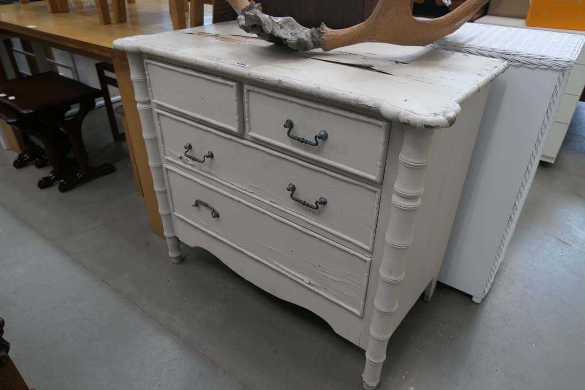 White painted bamboo effect 2 over 2 chest of drawers Height: 33.5"Depth: 21"Length: 40"2 handles
