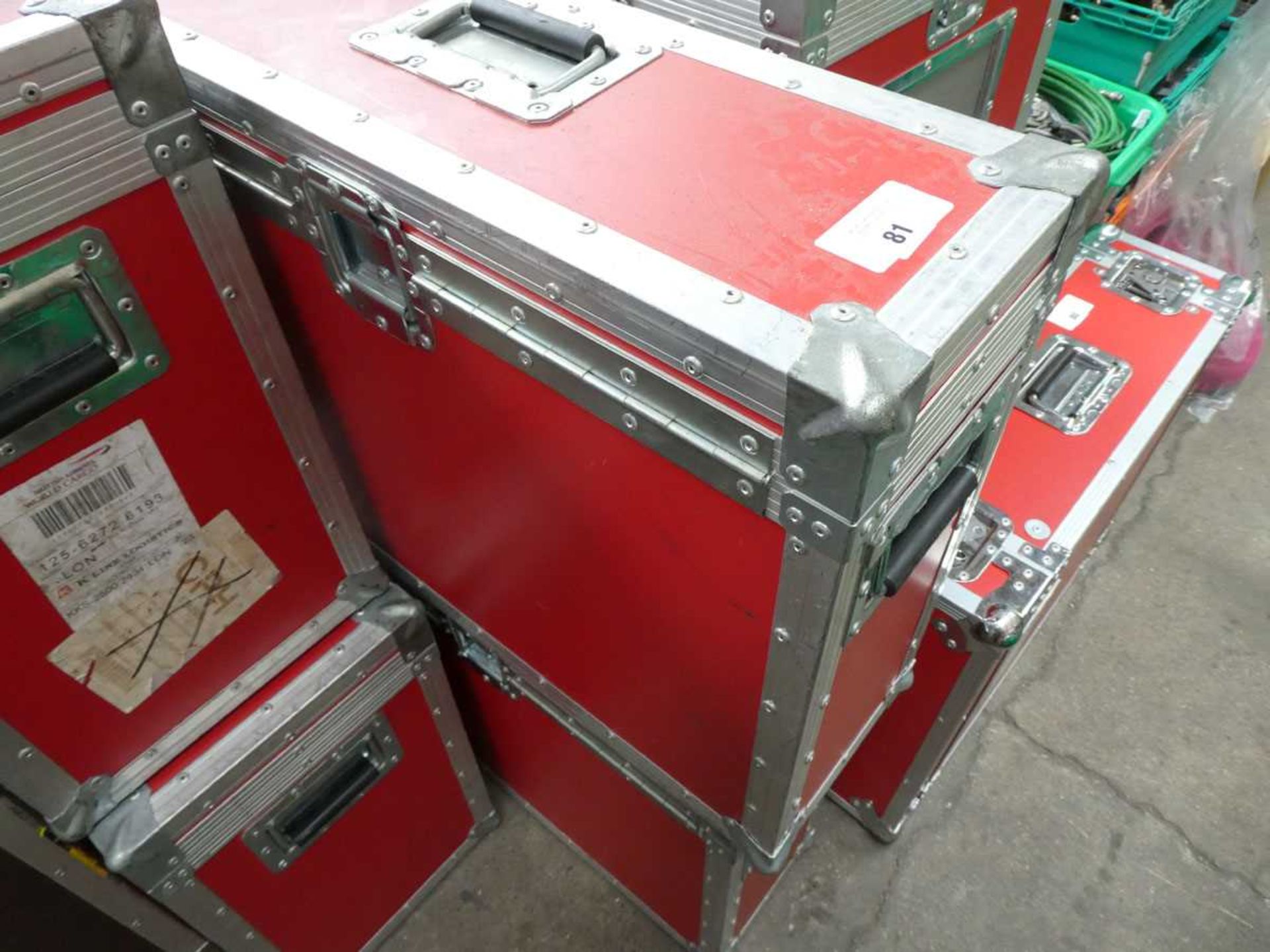 +VAT 2 top opening hinged padded flight cases in red each with a large monitor