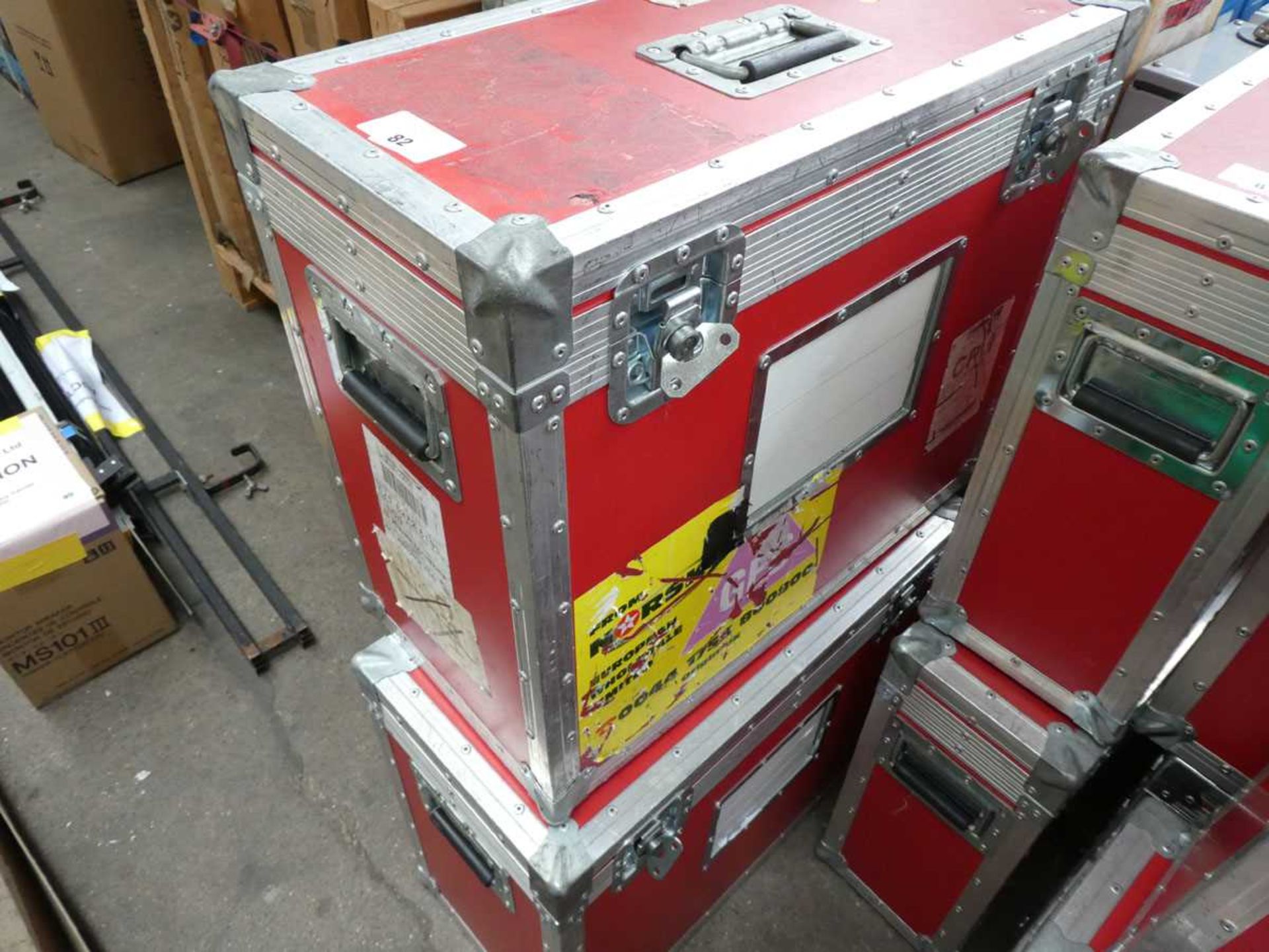 +VAT 2 top opening hinged padded flight cases in red each with a large monitor