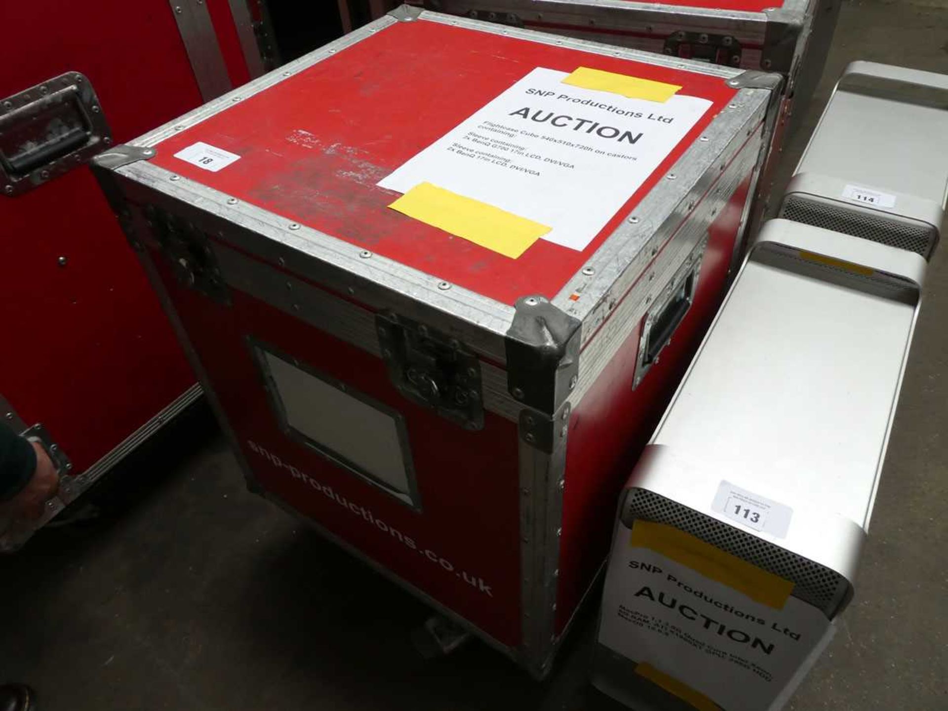 +VAT Red flight case cube on castors containing 4 BenQ 17" monitors
