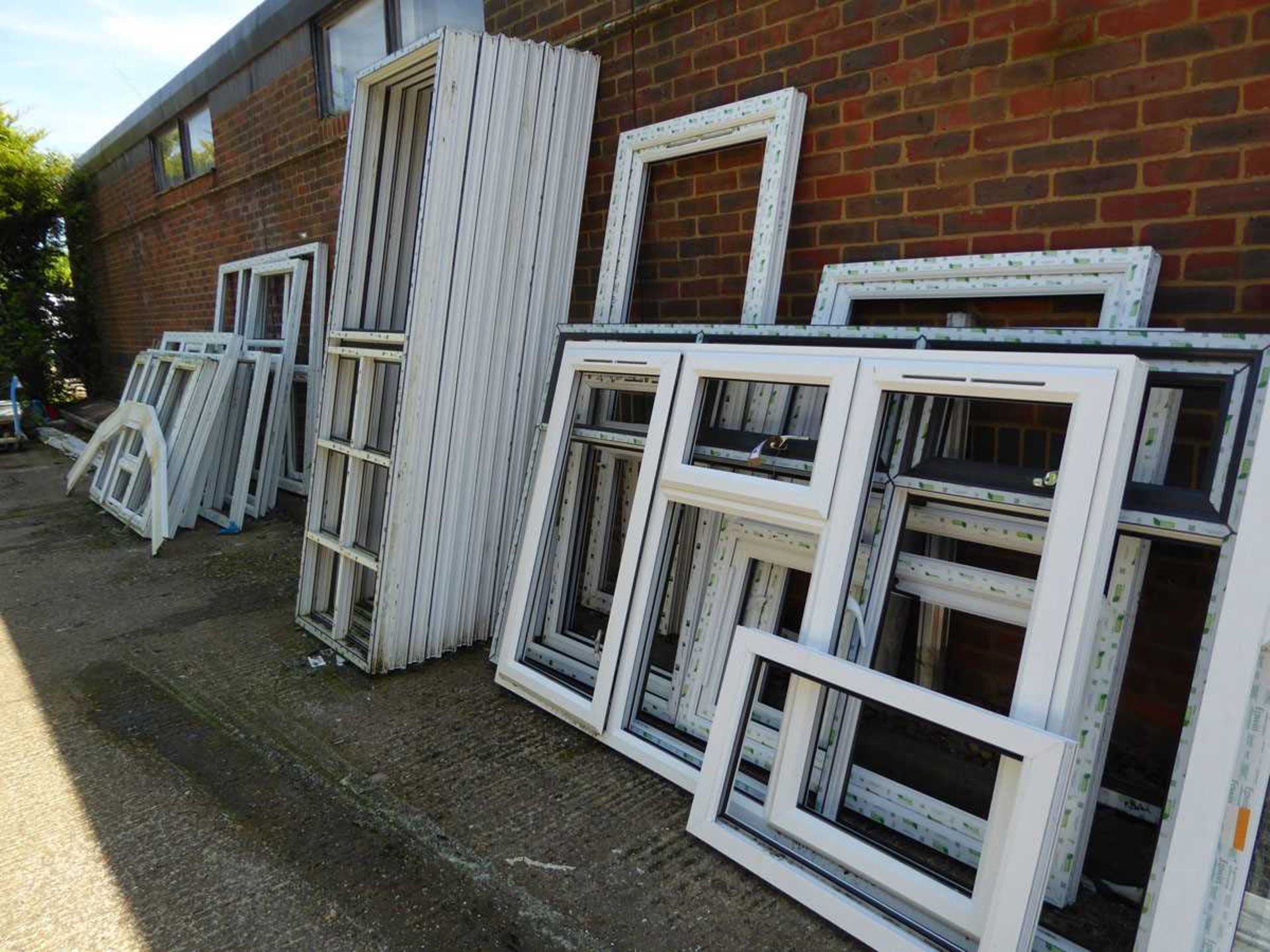 A range of PVCu window frames of various shapes and sizes (mainly without sealed units)
