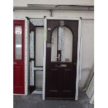 Dark wood effect PVCu door with frame, together with a similar coloured door and frame, no sealed