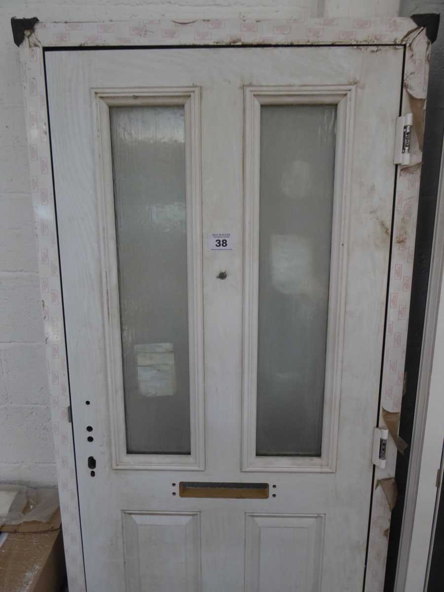 White PVCu exterior door with frame