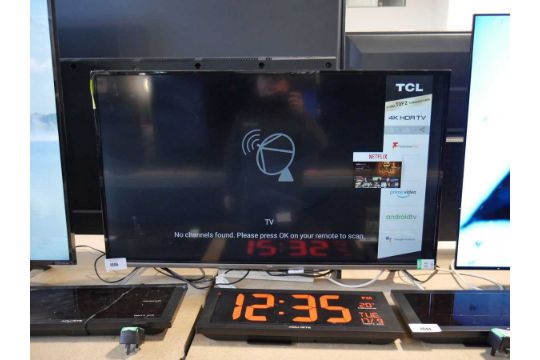 +VAT TCL 43" TV with stand and remote, model 43EP658