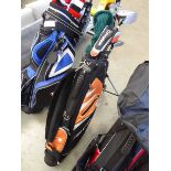 Fenrose golf bag with an assortment of 8x golf clubs to include putters, irons and drivers