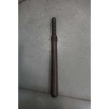 Turned wooden truncheon