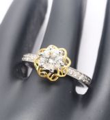 18 K / 750 White and Yellow Gold Solitaire Diamond Ring with Side Diamonds