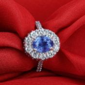 14 K / 585 White Gold Blue Sapphire ( IGI certified ) and Diamond Ring