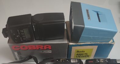 A Collection of 4 X Cameras - 1 X Minolta Cobra Flash – 1 X Slide Viewer.