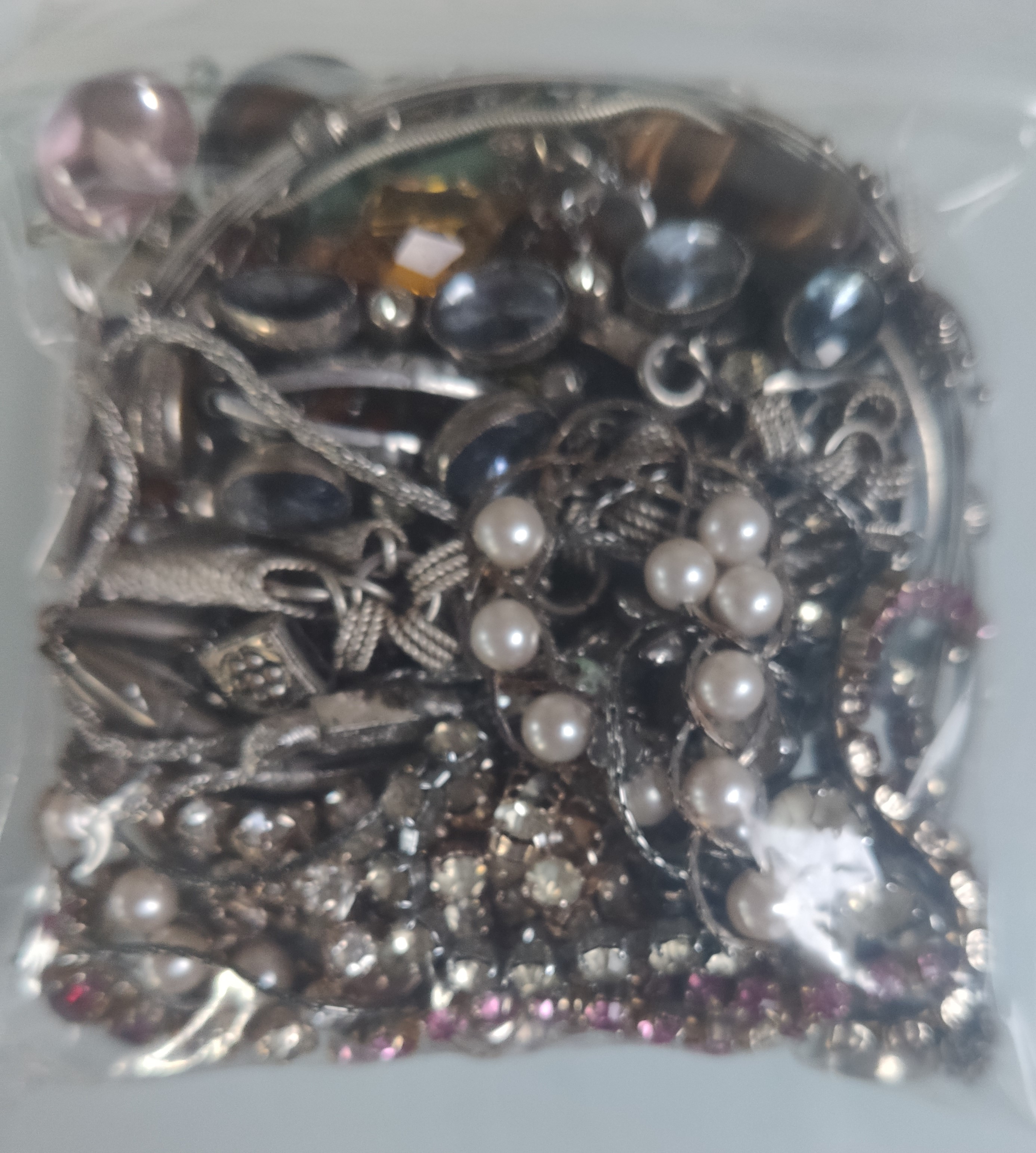 A Collection of White Metal Jewellery In A Bag. Approximately 296G.