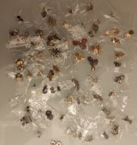 A Collection of Approximately 70 Pairs of Earrings.