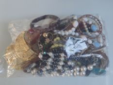 A Large Bag of Costume Jewellery.