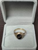 9Ct Gold Onyx Gent's Ring. Size Q ½.