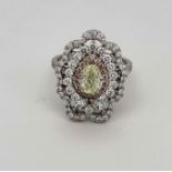 1.03 ct Fancy Light Yellow Green Pear Shape GIA Certificate VVS2 Strong Green and White Coll Diam...