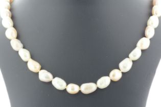 18 Inch Freshwater Baroque Shaped Cultured 8.0 - 8.5mm Pearl Necklace With Gold Plated Clasp