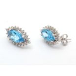 9ct White Gold Diamond and Blue Topaz Earring (BT3.73) 0.02 Carats