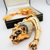 Vintage Gold Plated Crystal Lion Articulated Shoulder Brooch 7 inches Long c. 1980's