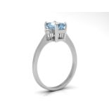 9ct White Gold Diamond and Emerald Cut Blue Topaz Ring (BT1.21) 0.04 Carats