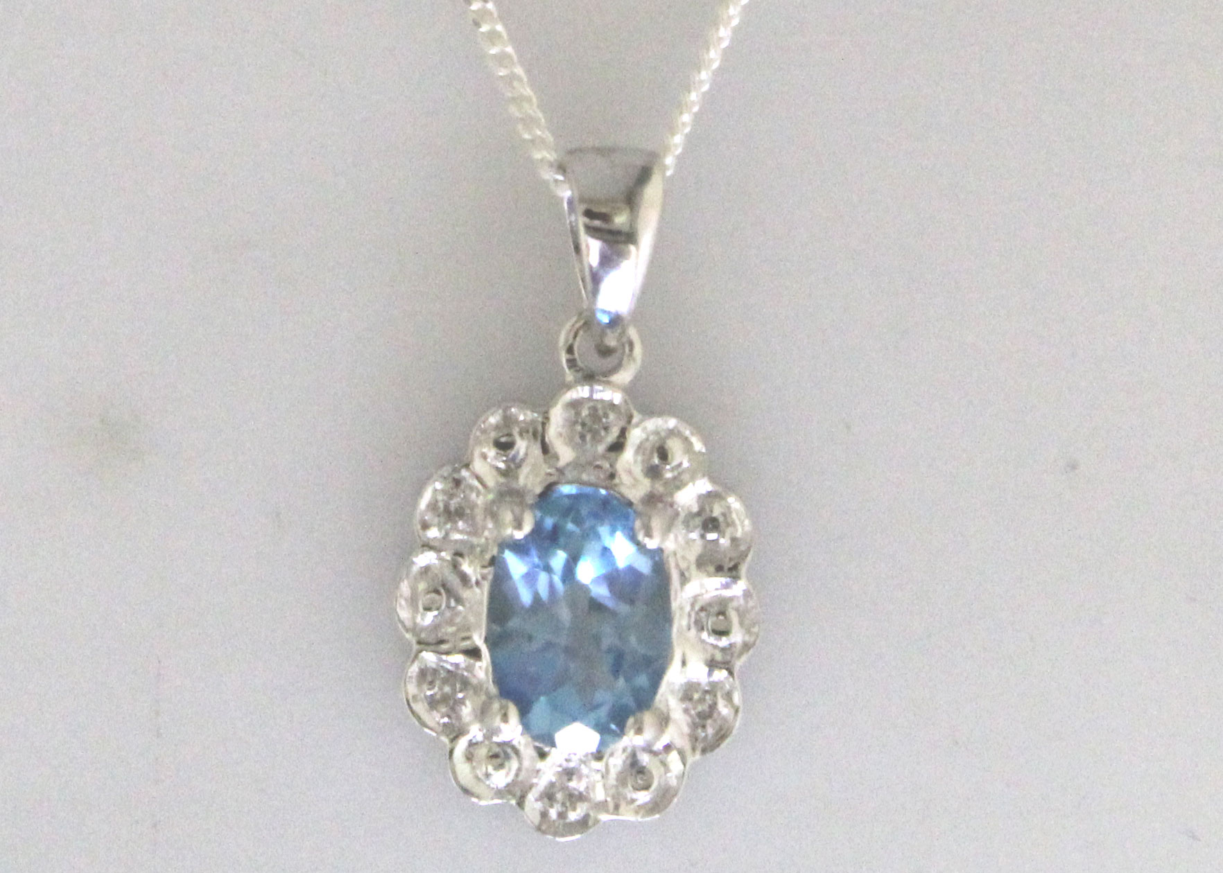 9ct White Gold Fancy Cluster Diamond Blue Topaz Pendant (BT0.86) 0.02 Carats - Image 5 of 6