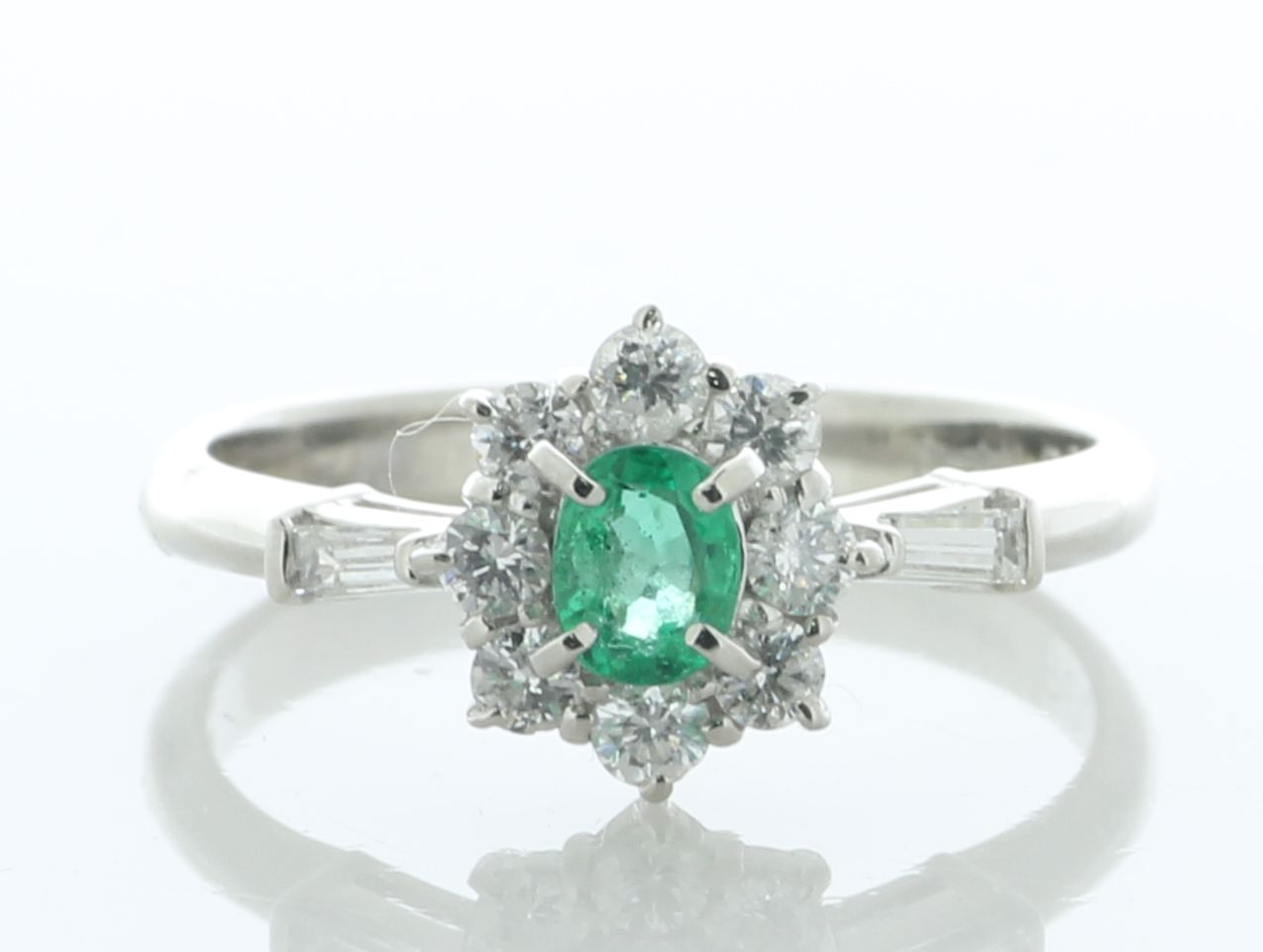 Platinum Oval Cluster Claw Set Diamond and Emerald Ring (E0.28) 0.38 Carats