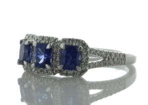 18ct White Gold Three Stone Emerald Cut Sapphire and Diamond Ring (S 1.20) 0.29 Carats