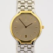 Omega / De Ville Symbol 18K Bezel - Unisex Gold/Steel Wristwatch