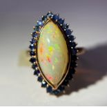 Beautiful Natural Opal Ring With Natural Blue Sapphire and 18k Gold