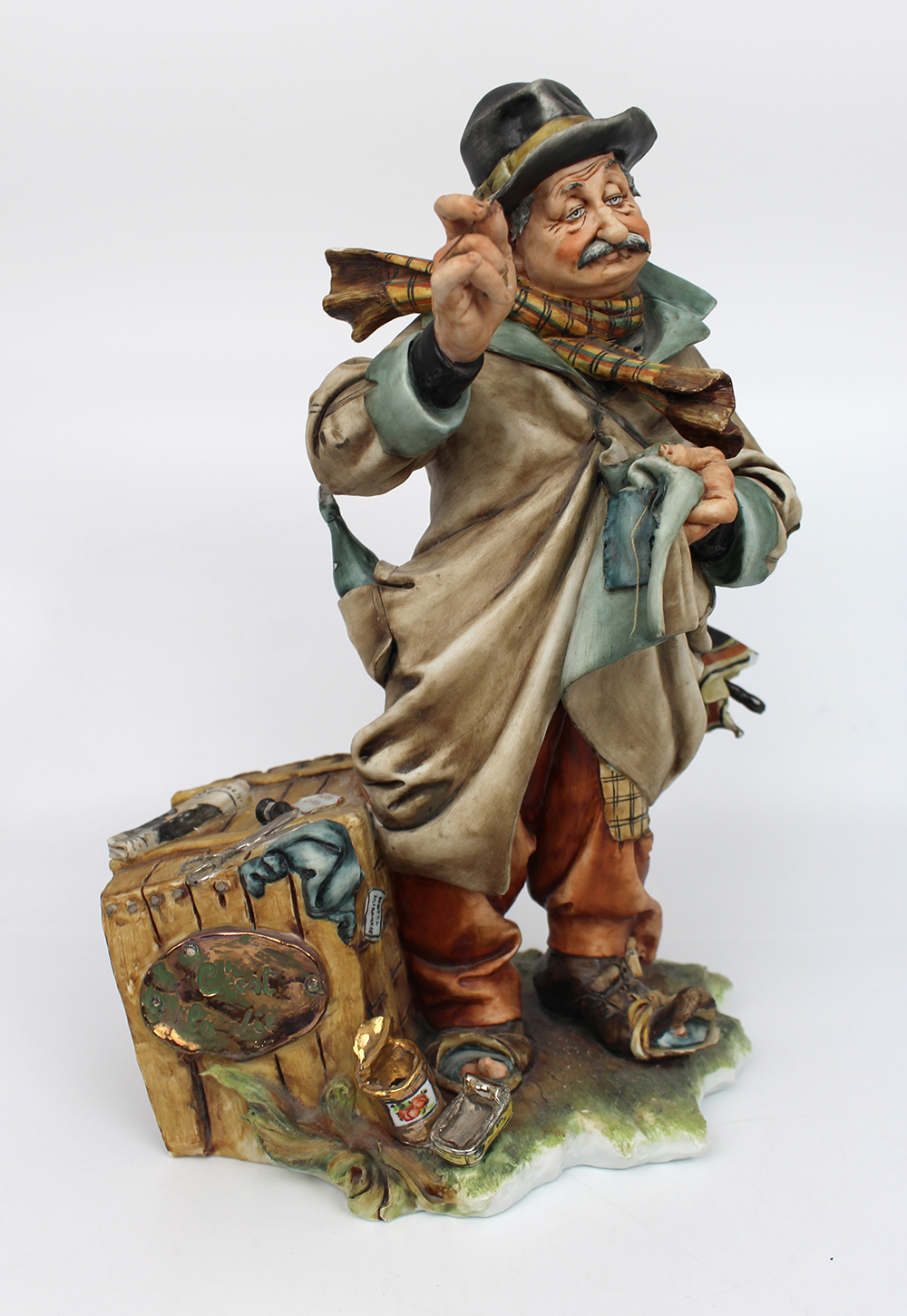 Capodimonte Tramp Patching His Coat by Tyche Bruno