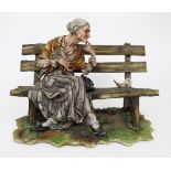 Capodimonte Lady Tramp on Bench