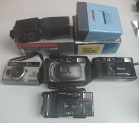A Collection of 4 x Cameras - 1 x Minolta Cobra Flash – 1 x Slide Viewer.
