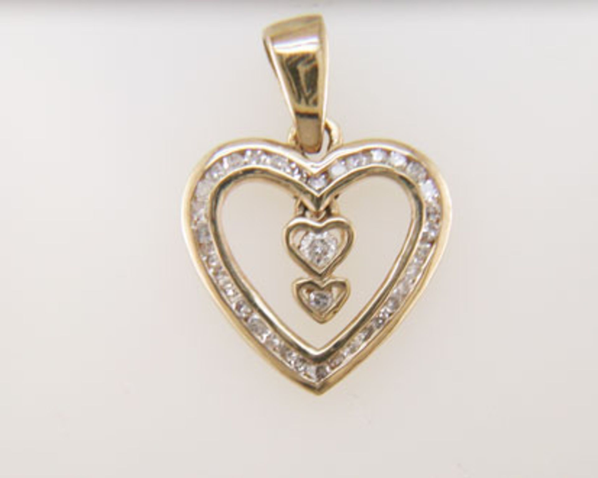 9ct Yellow Gold Heart Pendant Set With Diamonds & Two Hanging Inner Hearts 0.21 Carats - Image 5 of 6