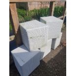 A set of 5 white rattan garden stools