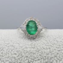 Stylish 1.05 Carat Emerald and Diamond Dress Ring In 18 Carat White Gold