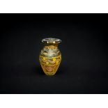 Antiquities: Roman Black, Yellow, and White Glass Bottle