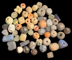 Collection of Ancient Egyptian Stone, Clay, and Bone Beads