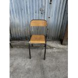 Wooden and Metal Chair In School Design