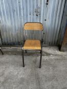 Wooden and Metal Chair In School Design