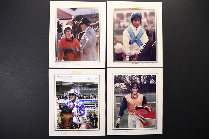 Horse racing photos bearing original signatures.