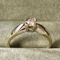 A 9ct Diamond Solitaire Engagement Ring With Valuation