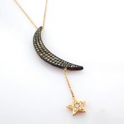 An Exquisite Carrie's Moon Necklace Intricately Detailed With Brilliant Diamonds and Gold On Silv...