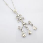 An Exquisite Necklace Intricately Detailed With Brilliant Diamonds and Gold