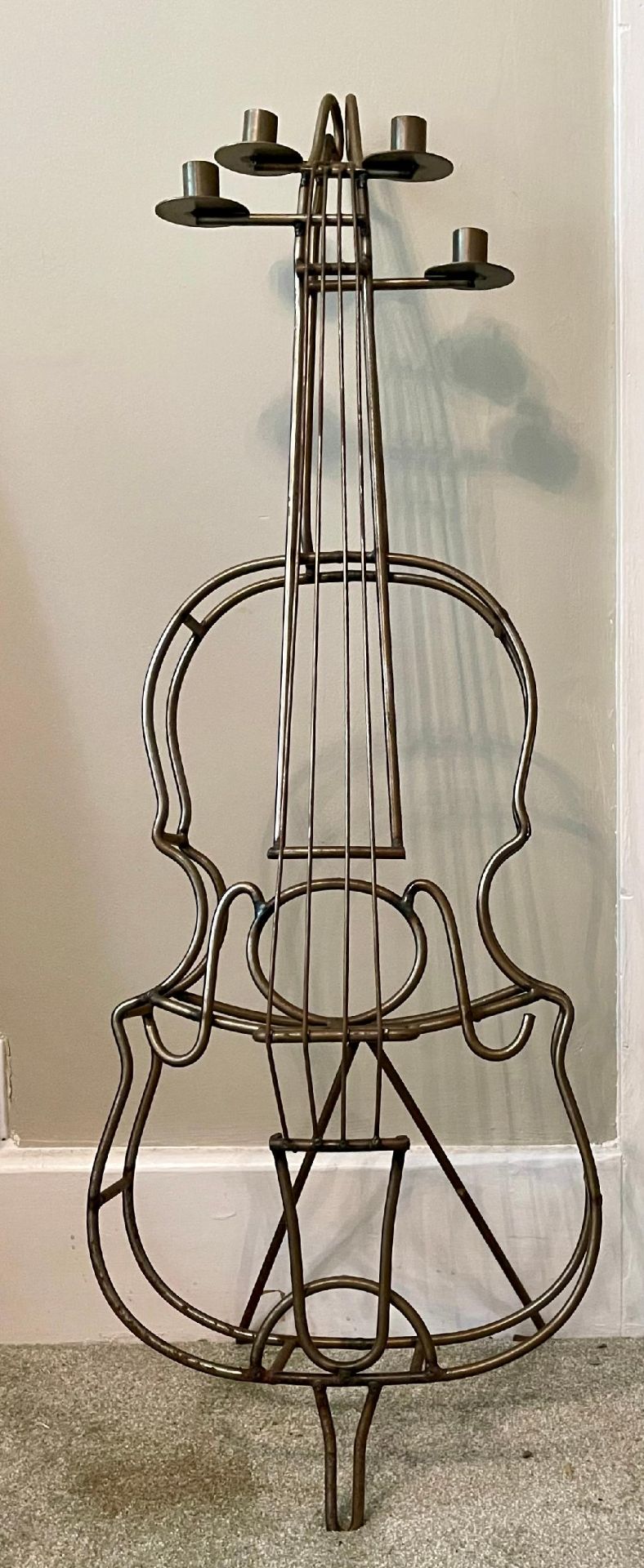 A Very Large Vintage Artisan Cast Iron Music Cello Shaped Candle Stand