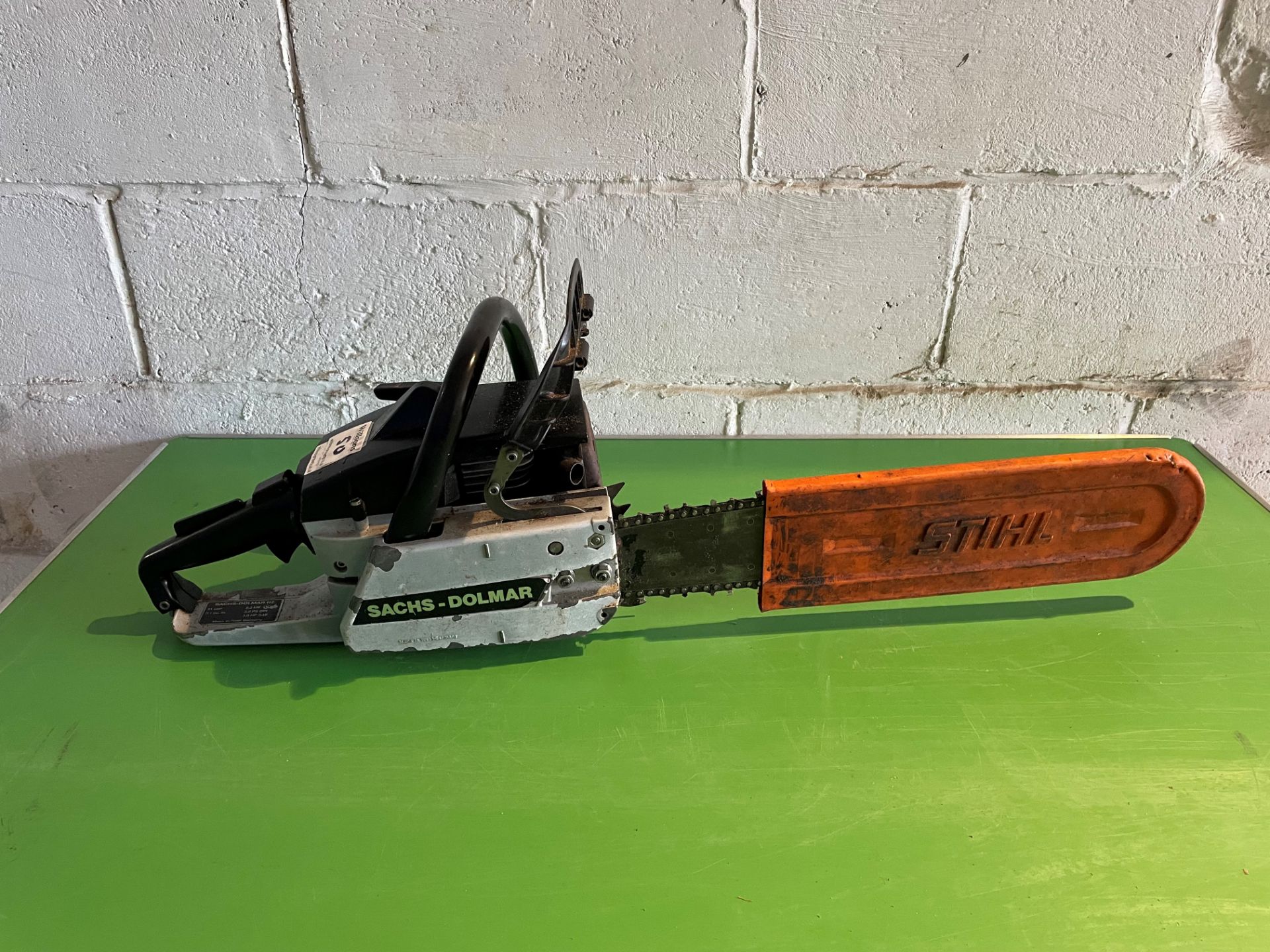 Sachs-Dolmer 112 petrol engine chainsaw with visor & oil & misc