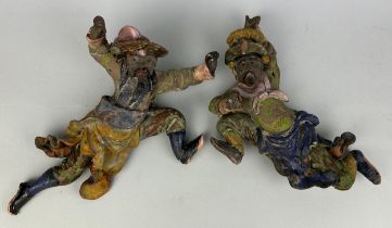 A PAIR OF CHINESE GLAZED CERAMIC DANCING FIGURES (2) Largest 22cm x 18cm