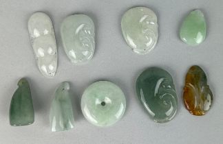 A GROUP OF CHINESE JADE STONES DEPICTING FRUIT, LOTUS AND OTHERS (9)