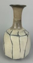 A GLAZED CERAMIC BOTTLE VASE, 20th Century, marked underneath. 21cm x 11cm