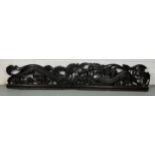A LARGE CARVED PANEL WITH DRAGONS, POSSIBLY CHINESE ROSEWOOD 19TH CENTURY 158cm x 28cm